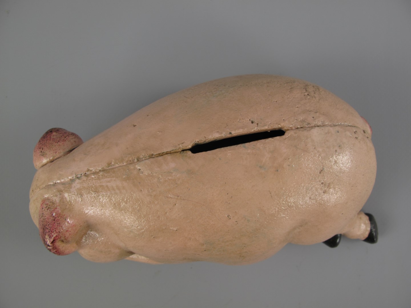 Sparschwein Schläfend Eisen farbig L.18x10cm