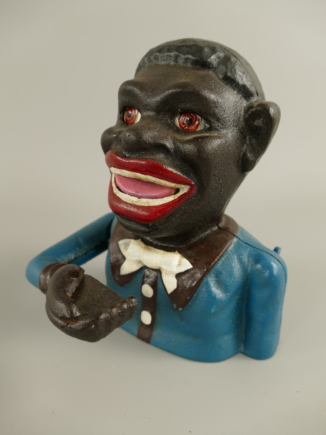 Spardose(Mechan.) Figur(Jolly) H.17x13cm