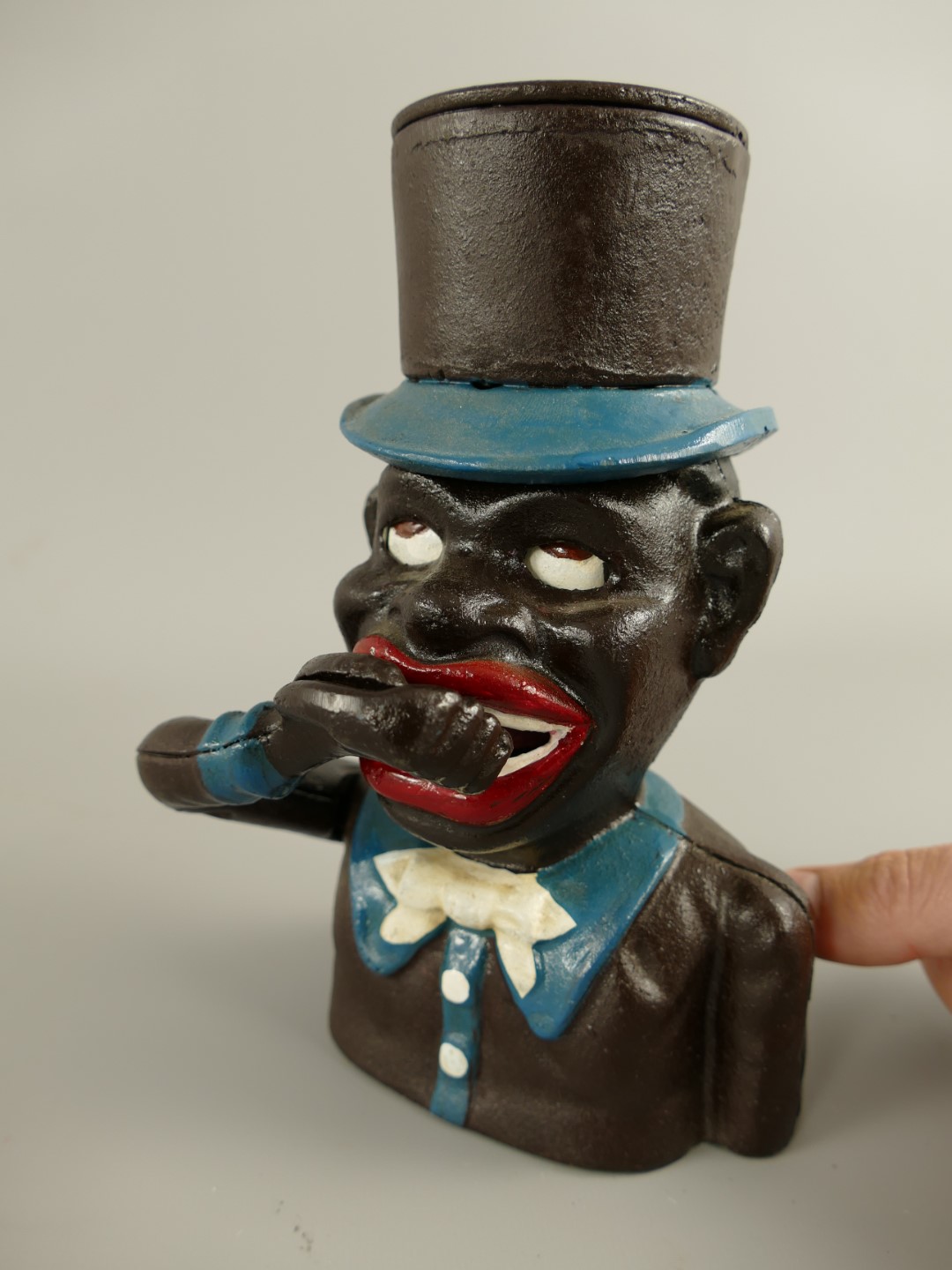 Spardose(Mechan.) Figur(Jolly) H.21x13cm