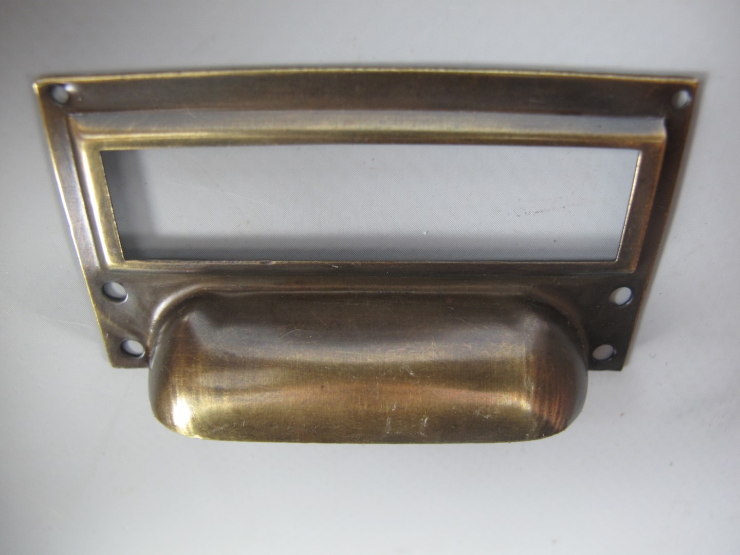 *NT Etiketrahmen/Griff Mess. brün.  L.70x40mm
