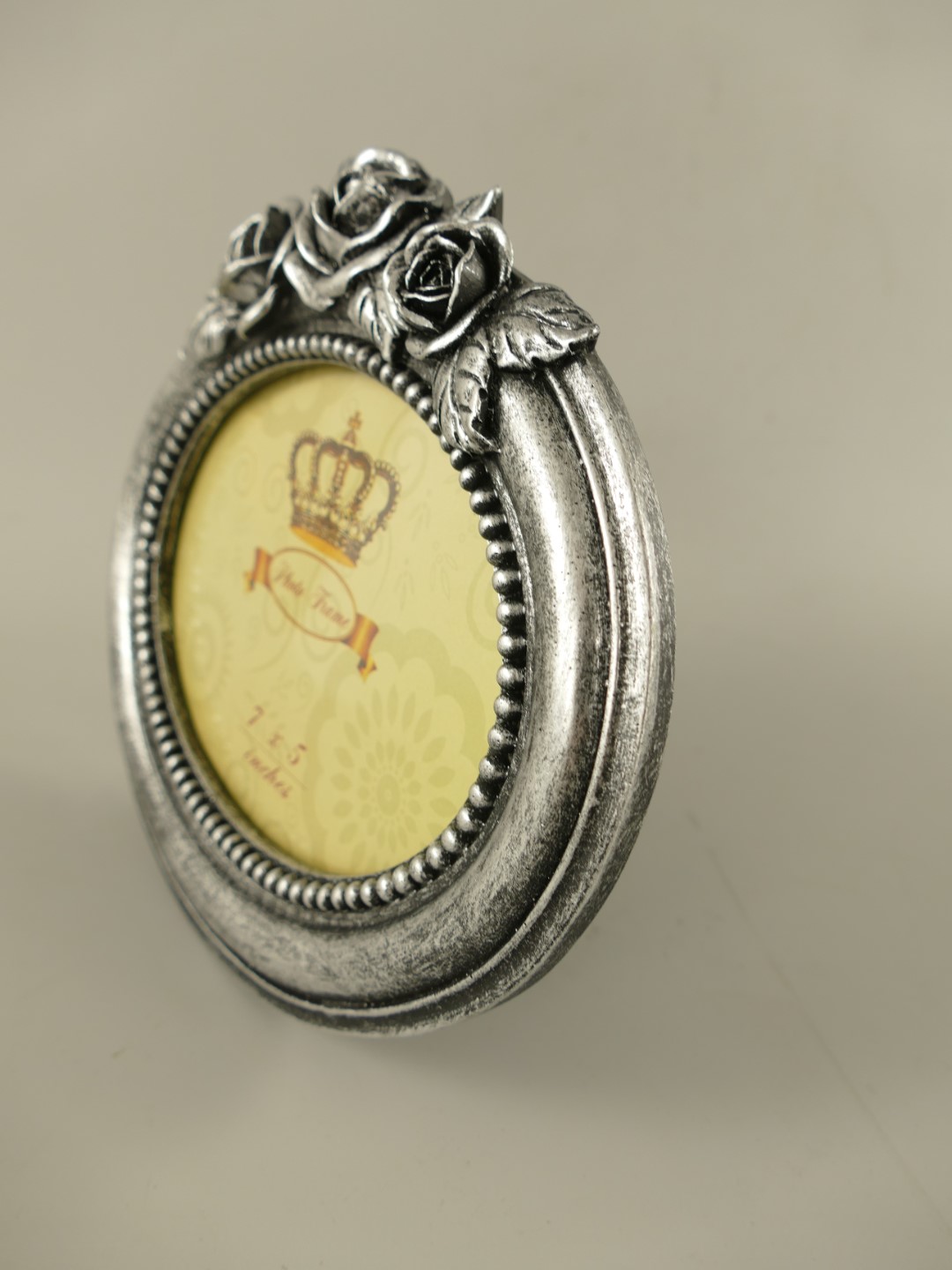*ANG. Bilderrahmen(7x5) Polyst. Silber farb H.20cm