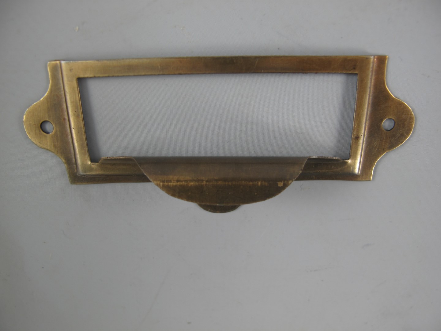 *NT Etiketrahmen/Griff Mess. brün.  L.90x40mm
