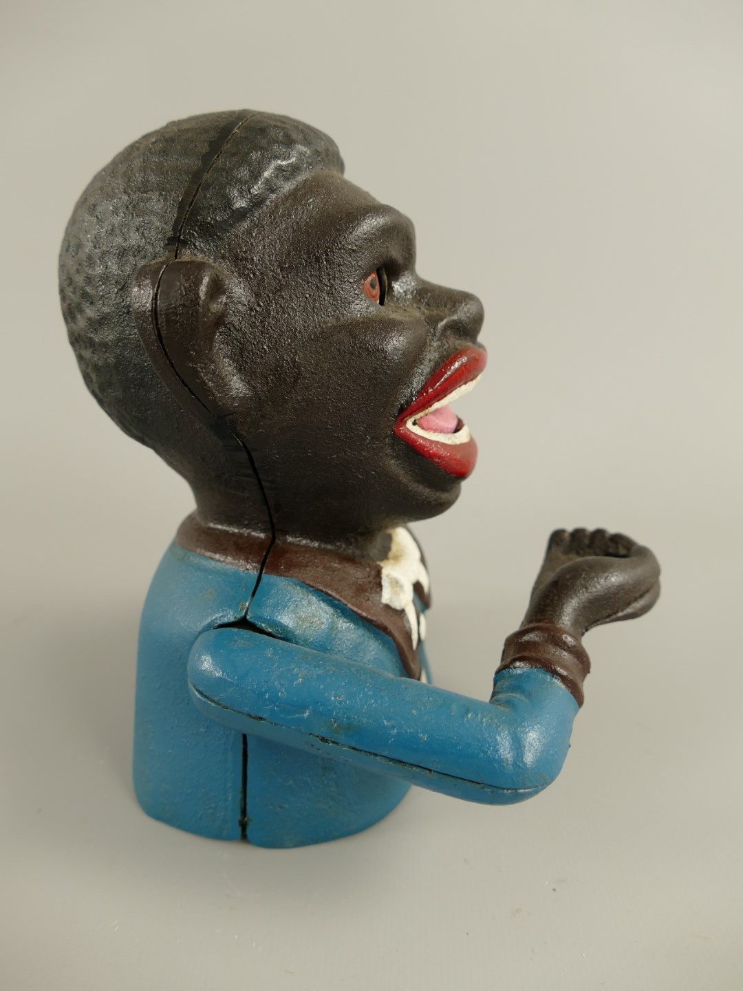 Spardose(Mechan.) Figur(Jolly) H.17x13cm