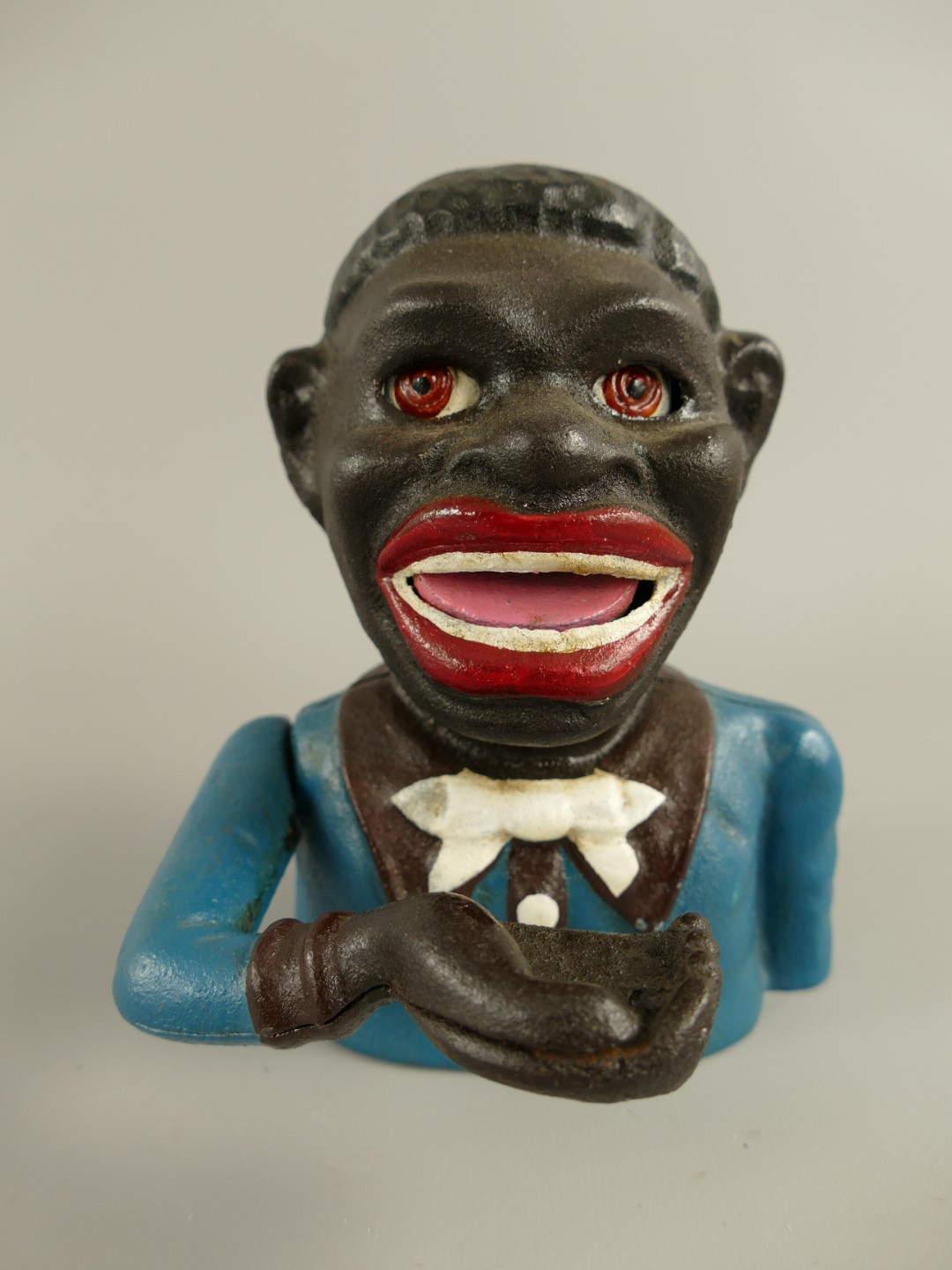 Spardose(Mechan.) Figur(Jolly) H.17x13cm