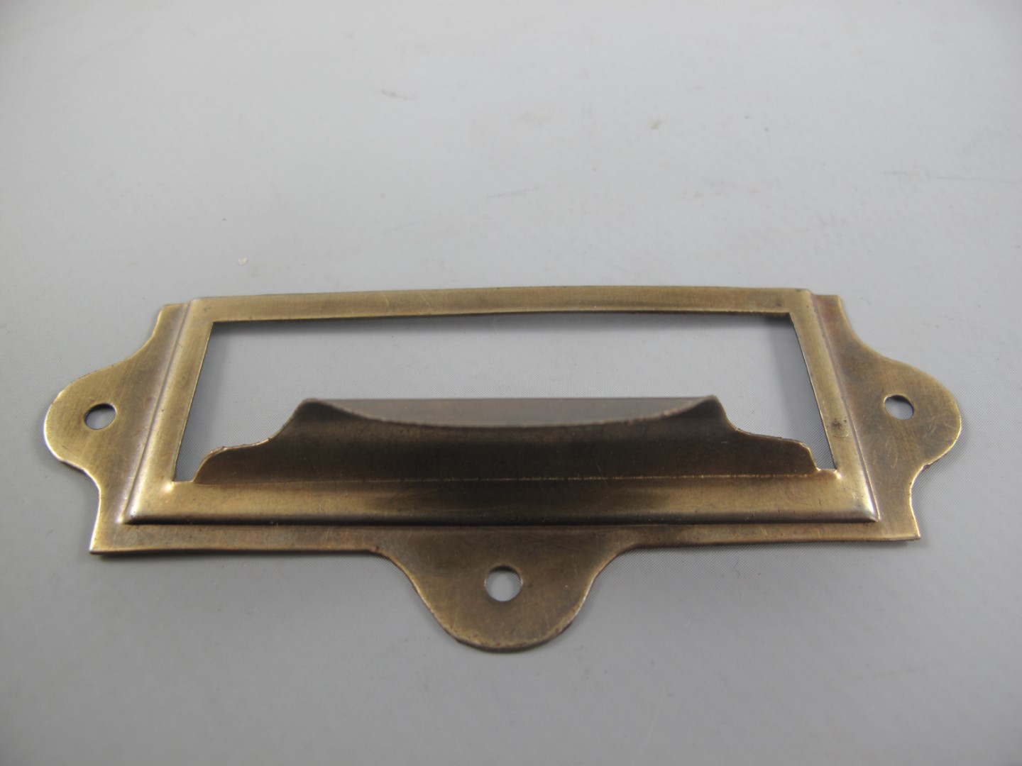 *NT Etiketrahmen/Griff Mess. brün.  L.90x40mm